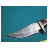 Hand crafted knife with a leather s...