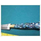 Hand crafted knife with a leather s...