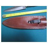 Hand crafted knife with a leather s...