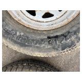 2 trailer tires and rims