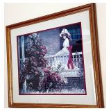 Framed Artwork of Woman on Porch with Red Bow, 33x29 in