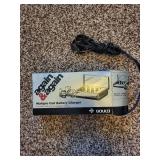 Gould Again & Again Multiple Cell Battery Charger with 4 D-Size Batteries