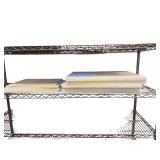 Shelf of assorted cutting boards