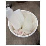 Bucket + Sauce Bottles (some lids)