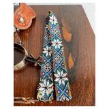 Collection of Western Spurs with Tooled Leather and Beaded Strap