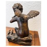 Bronze Cherub Figurine Playing Flute on Log with Birds