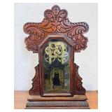 Antique Wooden Case Mantel Clock with Ornate Carving and Glass Panel