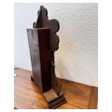 Antique Wooden Case Mantel Clock with Ornate Carving and Glass Panel