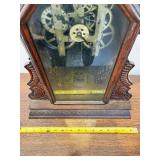 Antique Wooden Case Mantel Clock with Ornate Carving and Glass Panel