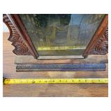 Antique Wooden Case Mantel Clock with Ornate Carving and Glass Panel