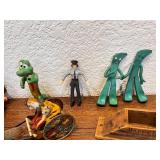 Collection of Vintage Toys and Collectibles Including Tin Wind-Up Donkey Cart, Gumby Figures, Model Trolley Cars