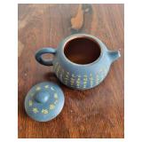 Yixing Clay Teapot with Chinese Script Decoration