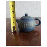 Yixing Clay Teapot with Chinese Script Decoration