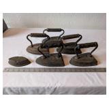Set of 4 Antique Cast Iron Sad Irons with Extra Plate