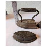 Set of 4 Antique Cast Iron Sad Irons with Extra Plate