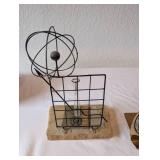 Collection of 3 Desk Decor Pieces Incl. Metal Globe Bookend, Science Award Sculpture, and Cast Iron Bottle Opener
