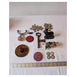 Eclectic Vintage Collectibles Lot with Figurines, Brass Signs, and Tokens