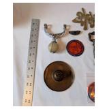 Eclectic Vintage Collectibles Lot with Figurines, Brass Signs, and Tokens