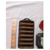 Antique Cast Iron Griswold Corn Stick Pan, Brass Dog Inkwell, and Vintage Toy Spinner Trio