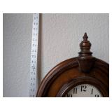 Antique Wooden Mantel Clock with Ornate Carvings and Key