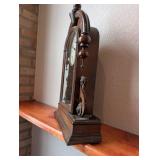 Antique Wooden Mantel Clock with Ornate Carvings and Key