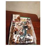 Flat of jewelry including 24K dipped holly ornament, Sarah Coventry, Western Germany, Celebrity, Trifari and more