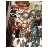 Flat of jewelry including 24K dipped holly ornament, Sarah Coventry, Western Germany, Celebrity, Trifari and more