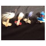 4 Vintage lead fishing lures with horsehair tails and multiple hooks