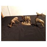 2 brass deer and a camel