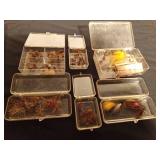 6 containers of fishing flies