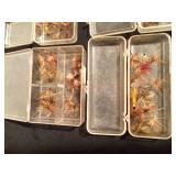 6 containers of fishing flies