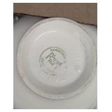 Two Boxes Filled With White Dishes