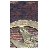 2 brass racing horse themed medallions