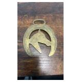 2 brass racing horse themed medallions