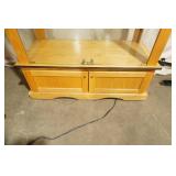 Lighted Glass Cabinet on wheels. Locking doors, 3 adjustable glass shelves