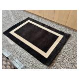 O - Wool Area Rug 6' x 4' - Black with Cream Border