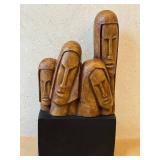 K - Replica Alva Museum Four Leaning Faces Sculpture