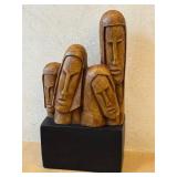 K - Replica Alva Museum Four Leaning Faces Sculpture