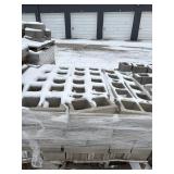 Two Stacked Pallets Of Concrete Block