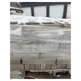 Two Stacked Pallets Of Concrete Block