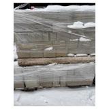 Two Stacked Pallets of Concrete Blocks
