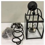 Black Iron Lantern Pendant Light and a Industrial Style Iron Swirl Light