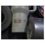 Stanley mug, duct tape and bandaids...