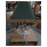 Gold lamp with green cloth shade...