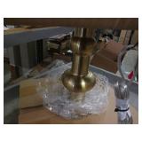 Gold lamp with green cloth shade...