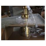 Gold lamp with green cloth shade...