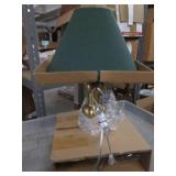 Gold lamp with green cloth shade...