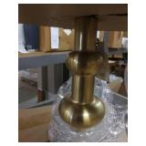 Gold lamp with green cloth shade...