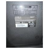 Insignia 32-Inch LCD TV with Sony DVD Player on Wood Stand