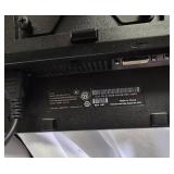 Two Dell E2011Ht monitors on a dual-screen desktop stand; cables are not included.